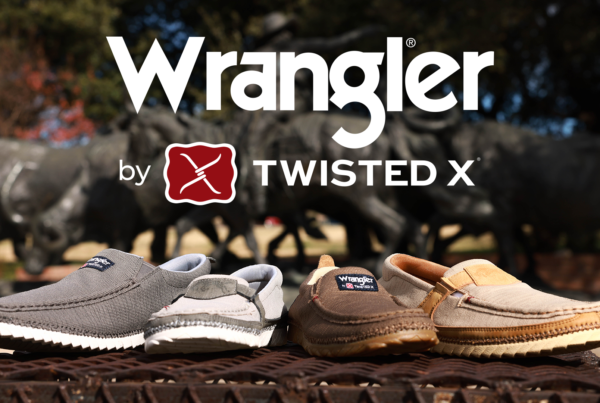 Shoes on a bench with Wrangler by Twisted X in text above